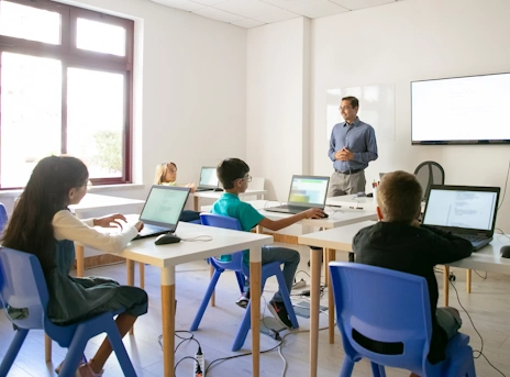 Teacher and students in a classroom